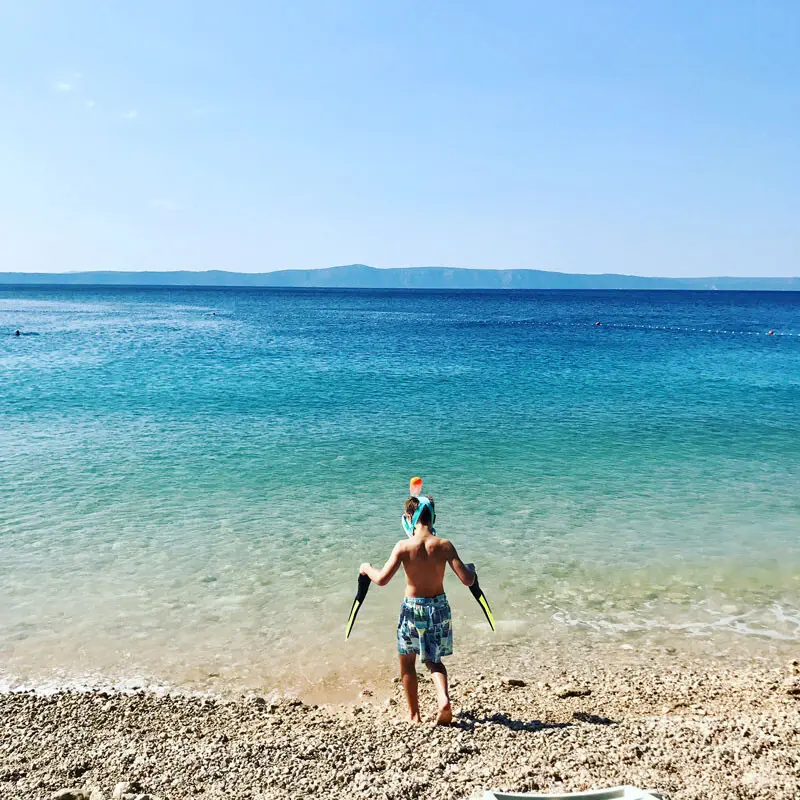 Kind Tucepi Beach Schnorcheln
